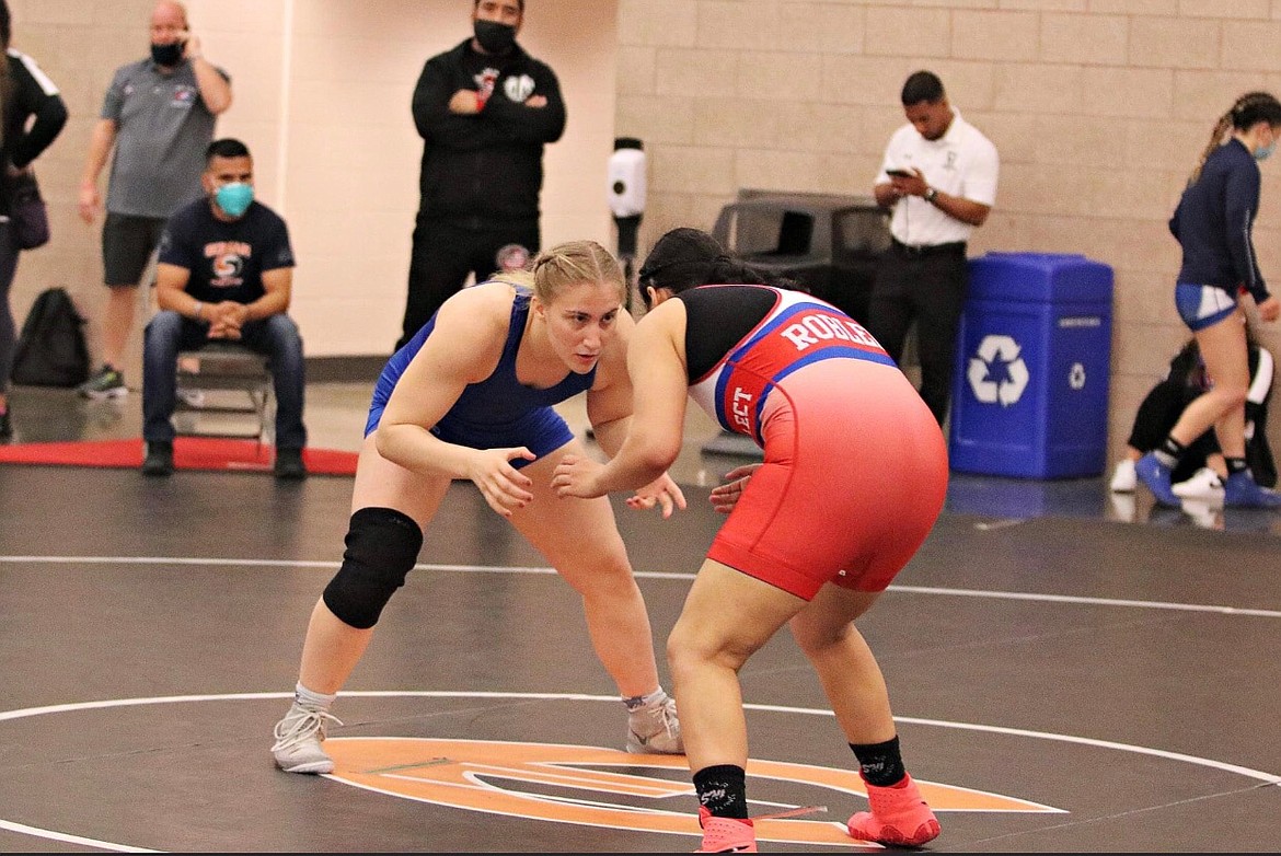 Big Bend Community College wrestler Avery Ackerman stares down her opponent at the United World Wrestling Junior Nationals at the Women's Nationals tournament in Irving, Texas, last weekend