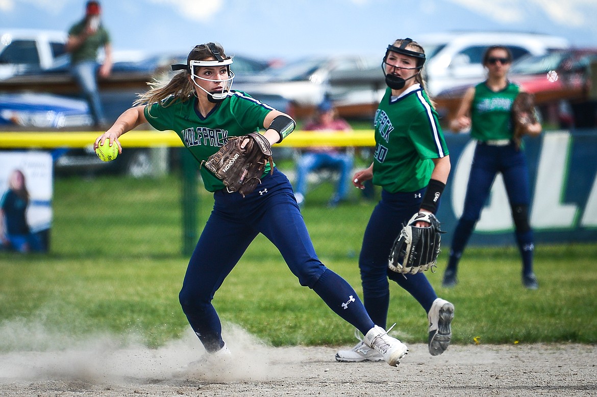 Glacier shorstop Sammie Labrum (10) fires to first to complete a 1-6-3 double play against Flathead at Glacier High School on Thursday. (Casey Kreider/Daily Inter Lake)