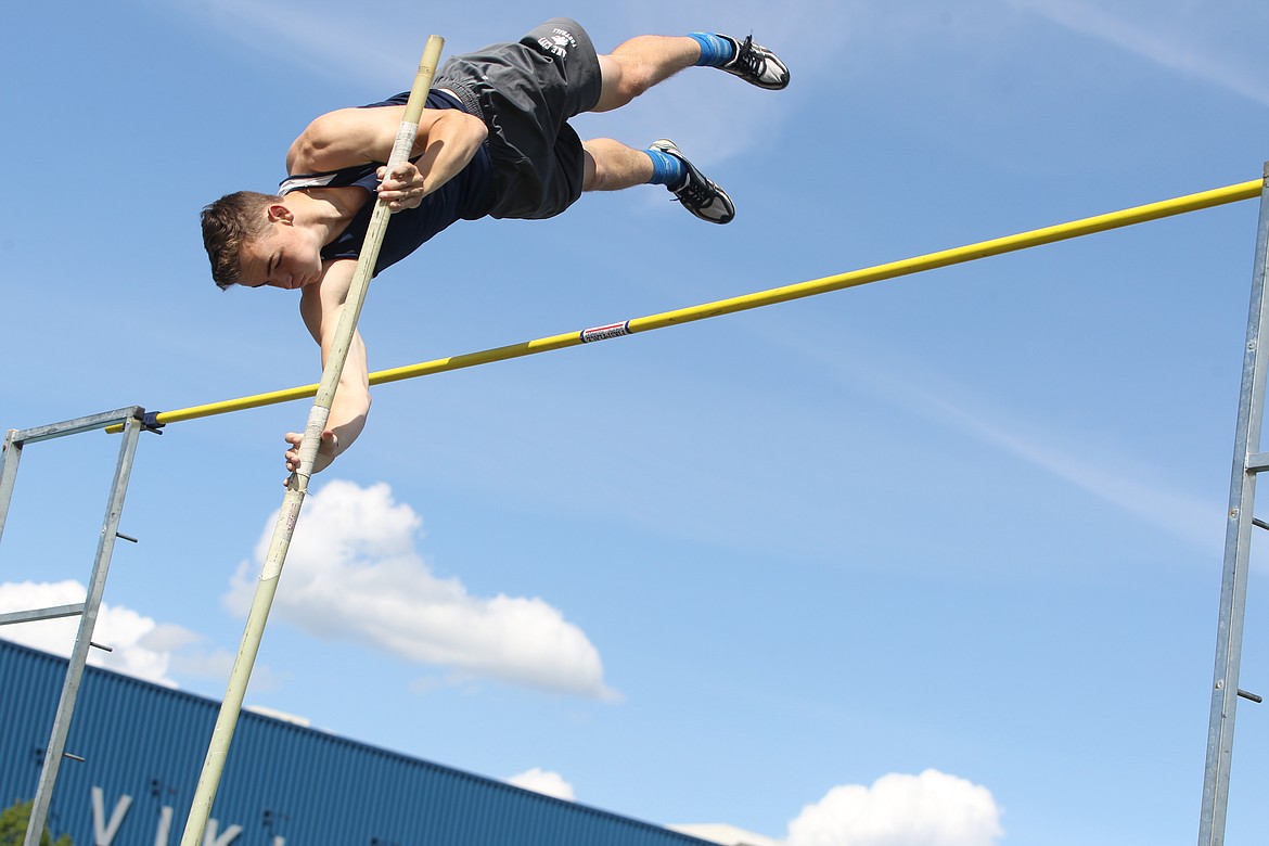 JASON ELLIOTT/Press
Lake City High senior Porter Howard clears the bar during a pole vault attempt in the 5A Region 1 meet on Thursday at Coeur d'Alene High. Howard won the event with a height of 13 feet, 1 inch. The meet concludes today in Lewiston.