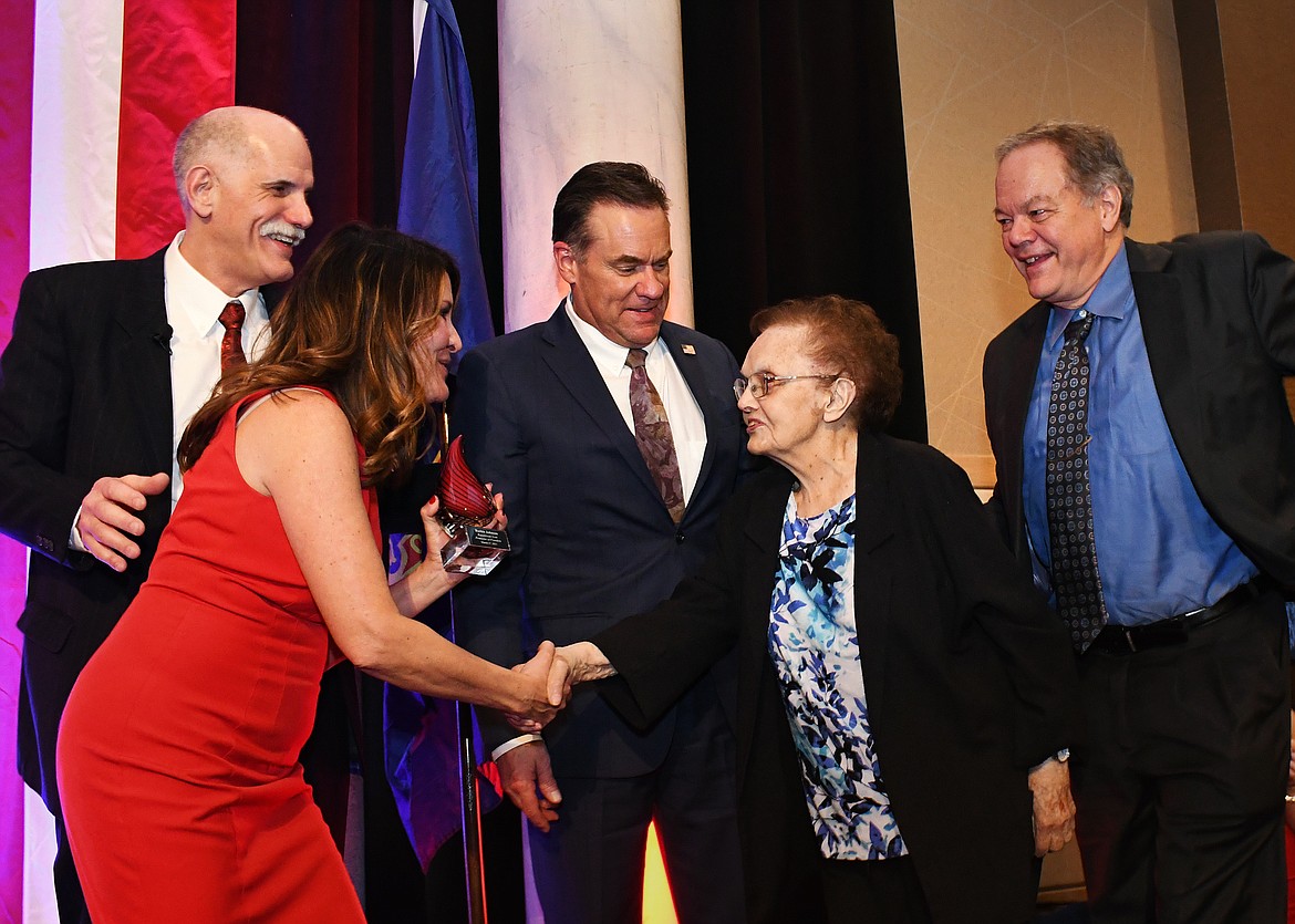 Ruthie Johnson received the Ruthie Johnson Defender of Freedom award at the  Kootenai County Republican Central Committee's 2021 Lincoln Day Dinner. The award encapsulates her life’s work in politics and will be annually awarded to those who most demonstrate her cause for individual freedoms. From left: KCRCC Chairman Brent Regan, Lt. Gov. Janice McGeachin, U.S. Rep. Russ Fulcher, Ruthie and her son, Dr. Duke Johnson.