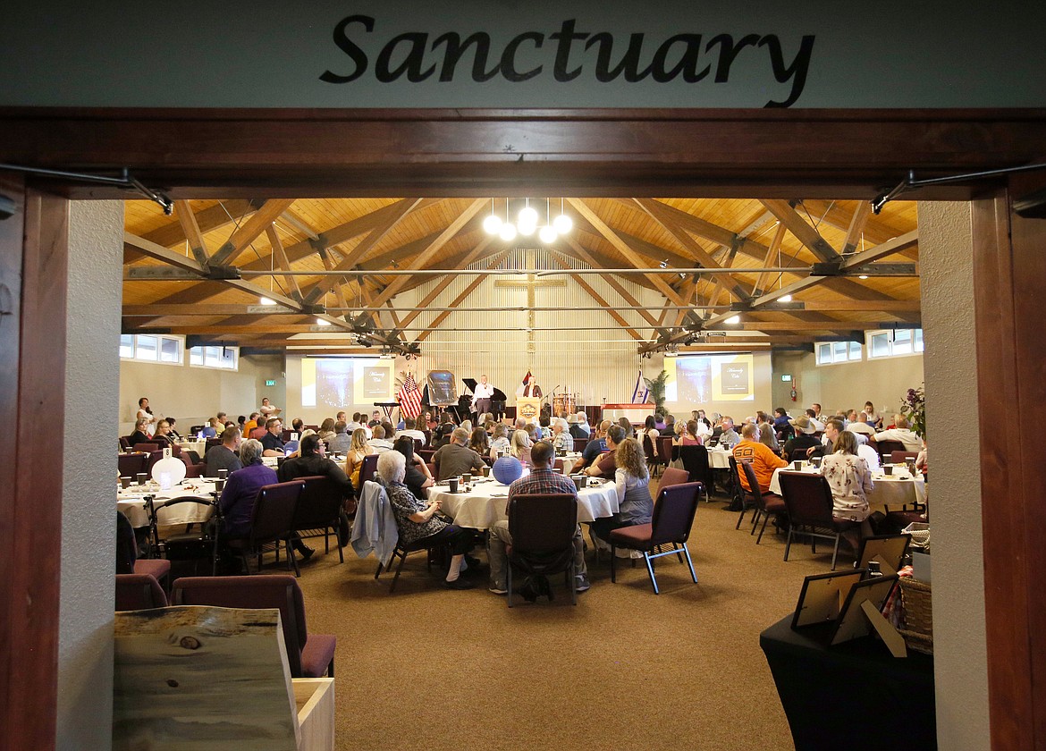 The crowd gathers in the sanctuary of The Altar Church for Friday night's Good Samaritan donor appreciation dinner.