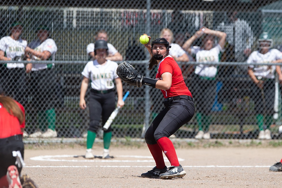 Cresanna Authier prepares to make a throw to first on Saturday.