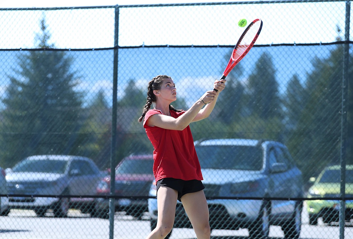 Kailee McNamee hits a return during the mixed doubles regional championship match on Saturday at Travers Park.
