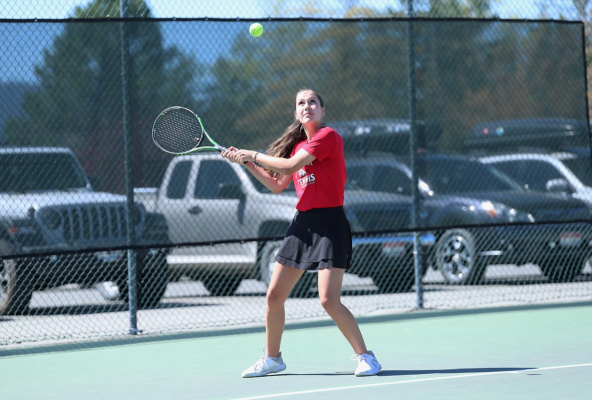 Olivia Petruso eyes a return shot during the girls doubles regional championship match on Saturday at Travers Park.