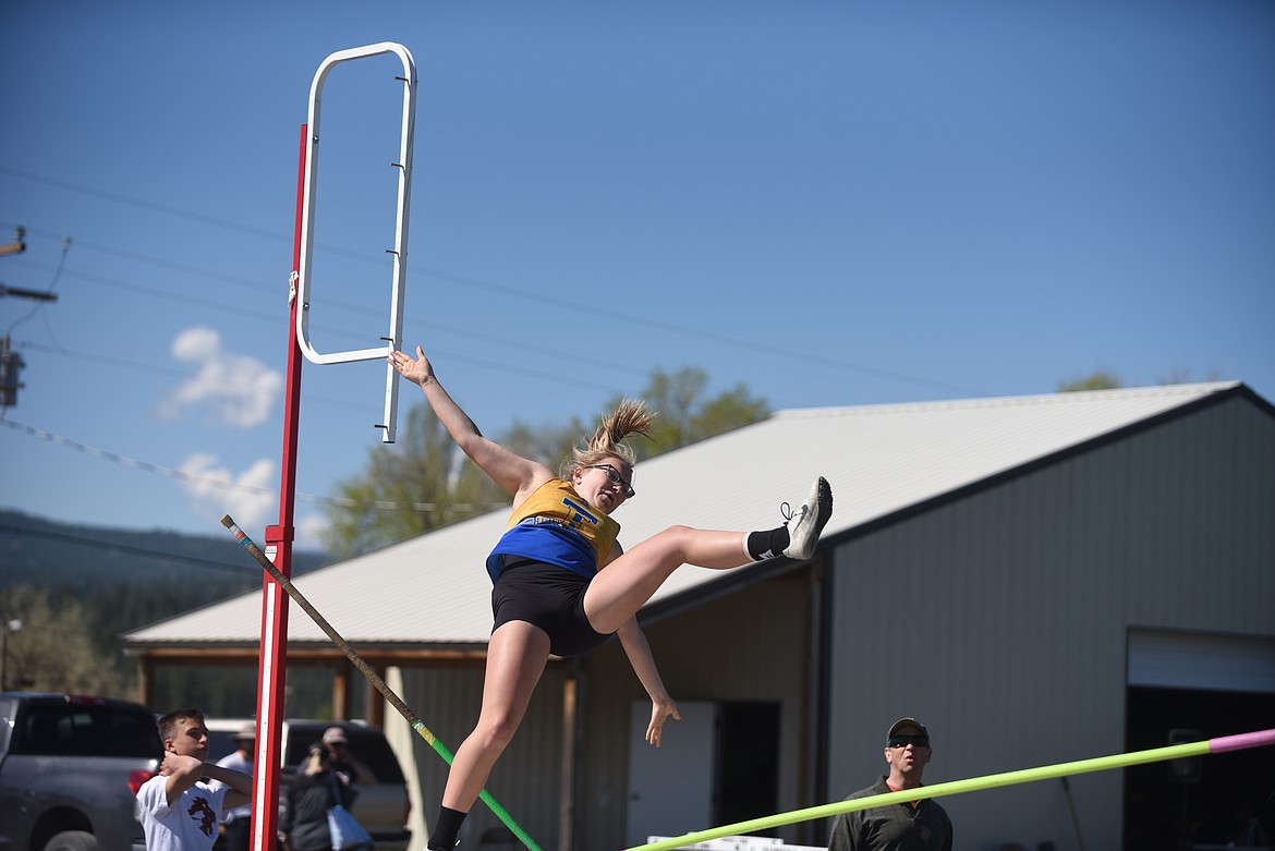 Thompson Falls' Chesney Lowe may not have cleared the bar on this leap, but she did pole vault a personal best 8 feet, 3 inches to win the event Saturday at the 7B District championships in Eureka. (Photo by Scott Shindledecker/Valley Press)