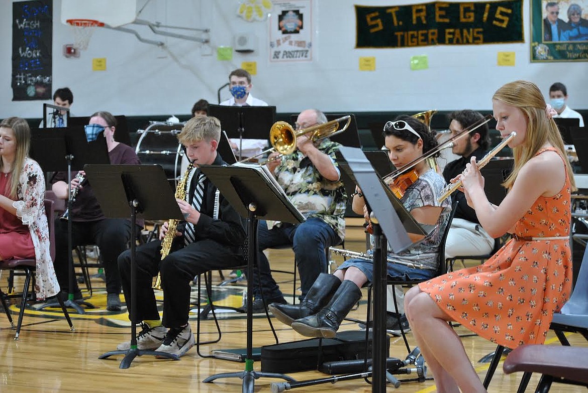 Front row, from left to right, are Dillon Thomas on the soprano saxophone, Grace Marie McGuffey on the violin, and Macy Hill on the flute play during St. Regis High School's first concert of the year open to the public. (Amy Quinlivan/Mineral Independent)