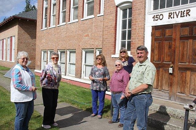 Sue McLees (left) and Toots Bricker present a check for $2,000 each to Jennifer Donovan and Sheryl Crabb with Pool in the Park, Carol Johnson, chair of The Mineral County Fair and Roger Kesting with the Superior Lions Club. (Monte Turner/Mineral Independent)