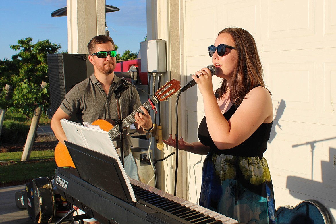 Ramiro Espinoza and Elaine Eagle of End of the Line performing at the Beaumont Cellars Winery wine release party.