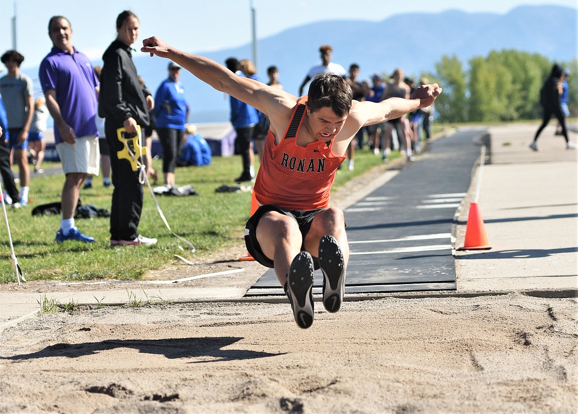 Daniel Kelsch of Ronan competes in the long jump Saturday at Polson. Kelsch has qualified to compete at the Class A state meet in the javelin. (Scot Heisel/Lake County Leader)