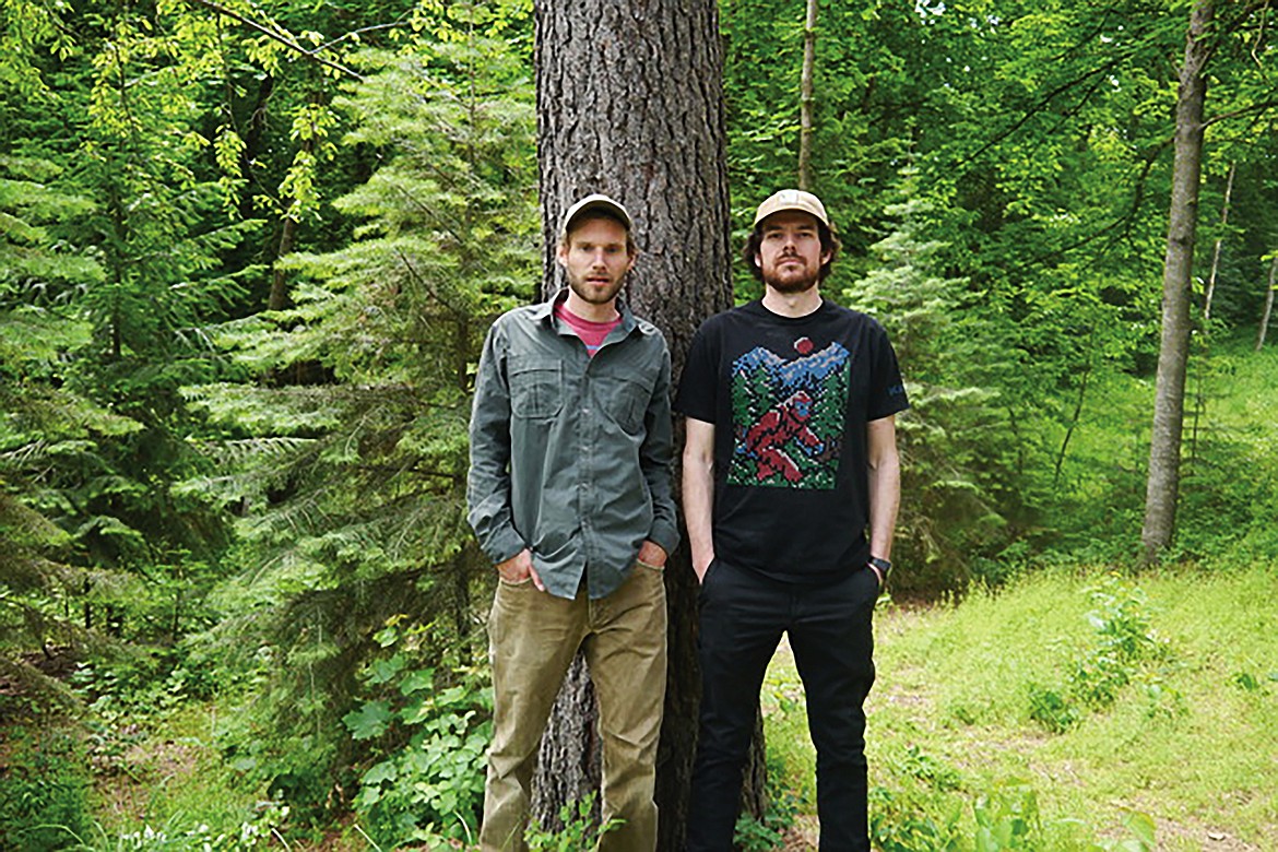 Graduate students Chris Lamb, left, and Jack Kredell are compiling oral histories about caribou to raise awareness of their former existence in the southern Selkirk Mountains.