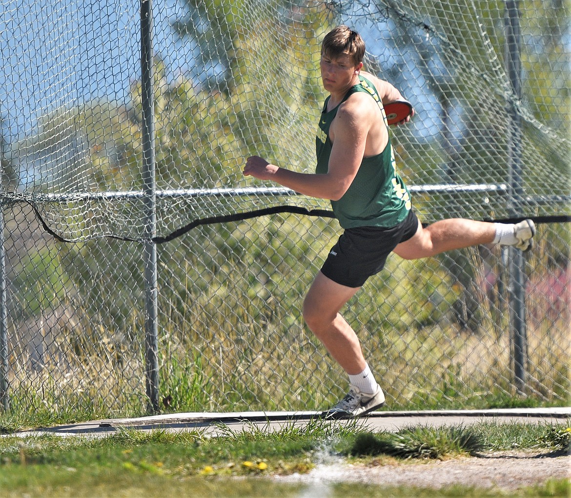 Whitefish thrower Talon Holmquist competes in the discus event at the Polson A-B-C track and field meet on Saturday. (Scot Heisel/Lake County Leader)