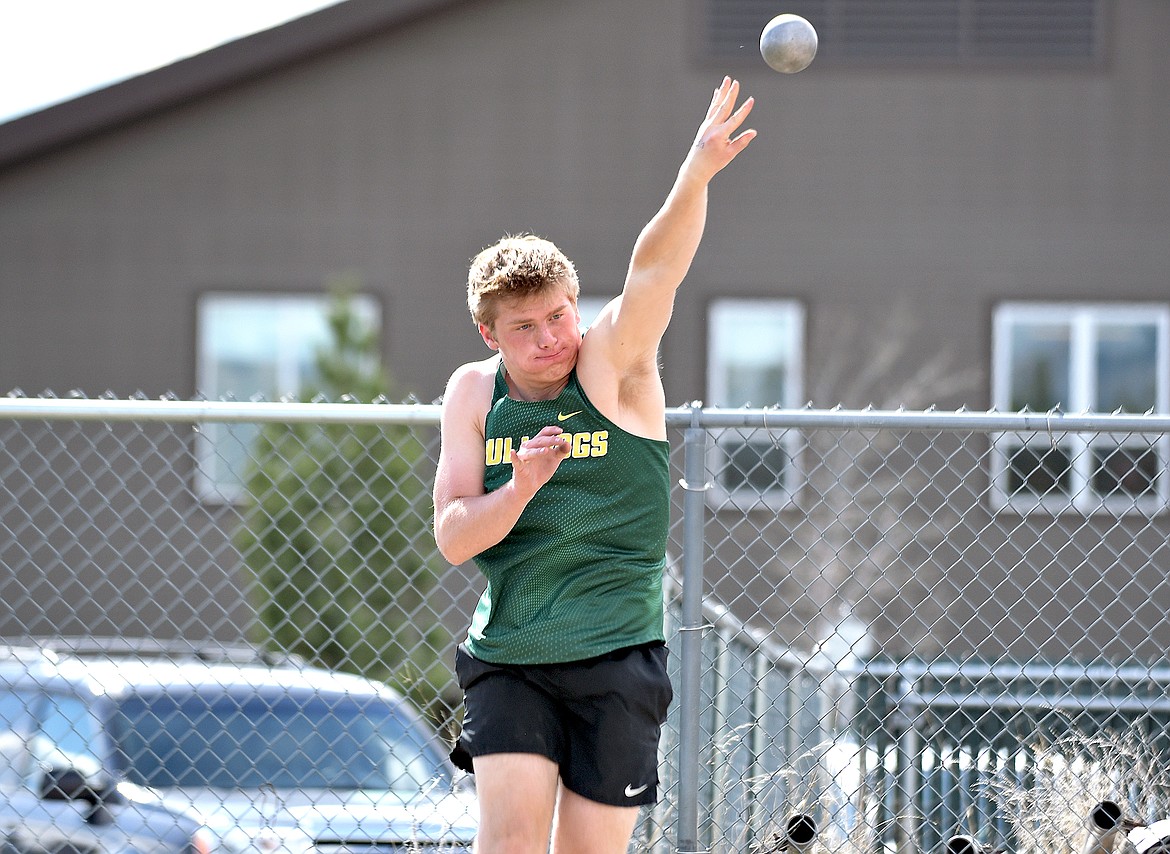 Bulldog Ben Dalen participates in the shot put event at the Whitefish-Flathead track dual on Thursday at WHS. (Whitney England/Whitefish Pilot)