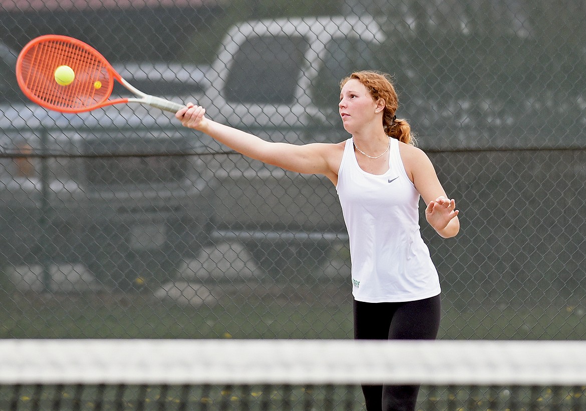 Whitefish's Tallory Workman plays in a No. 1 doubles match against Libby on Thursday in Whitefish. (Whitney England/Whitefish Pilot)