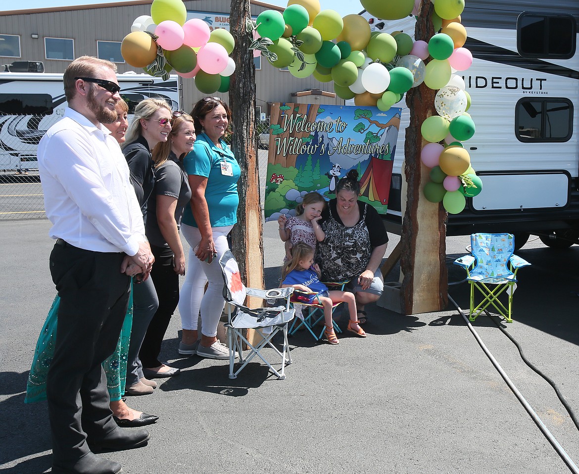 Northwest Specialty Hospital, Blue Dog RV and Make-A-Wish Idaho make a camping dream come true for 4-year-old Willow Leavitt, seated, on her birthday on Monday.