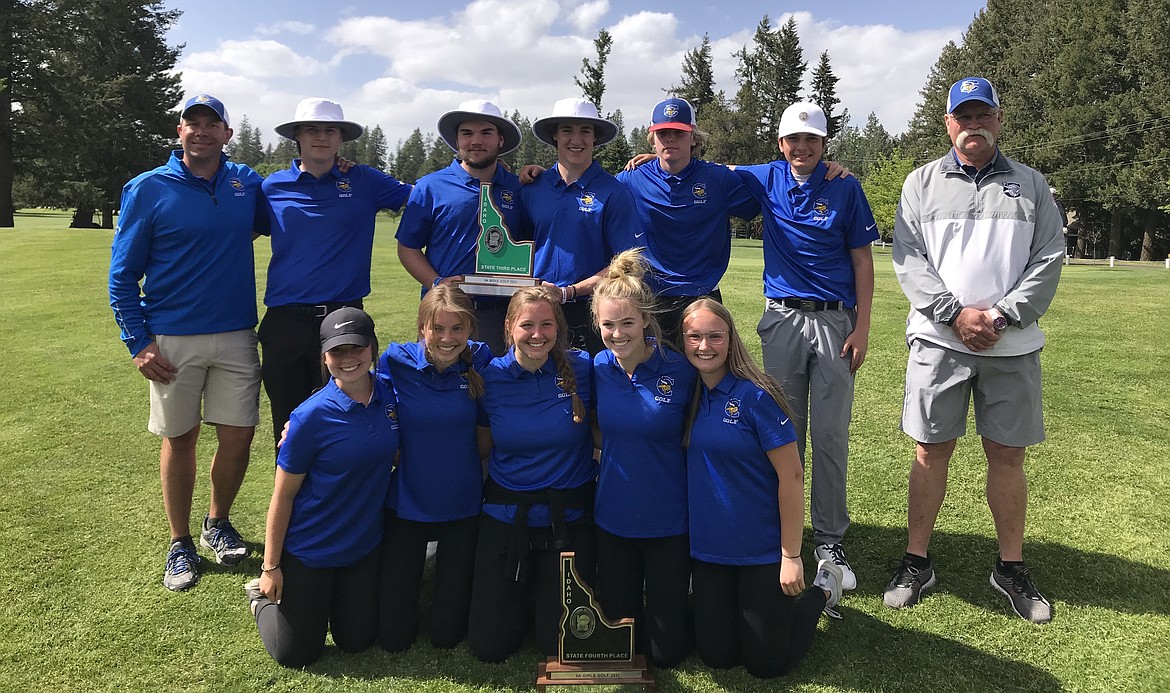 Courtesy photo
Coeur d'Alene High's boys and girls golf teams pose with their trophies following the state 5A tournament Tuesday at Avondale Golf Club in Hayden Lake. The Viking boys placed third, the girls fourth. In the front row from left are Holly Hudson, Paige Crabb, Marin Rowley, Taylor Potter and Brianna Priest; and back row from left, boys coach Chase Bennett, Wyatt Williams, Cole Jaworski, Parker Freeman, Trey Nipp, Luke West and girls coach Craig Leaf.