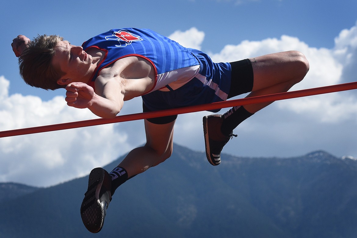 Wyatt Duke narrowly missed setting a new district record in the high jump Saturday, winning the event by clearing 6 feet, 6 inches. (Jeremy Weber/Bigfork Eagle)