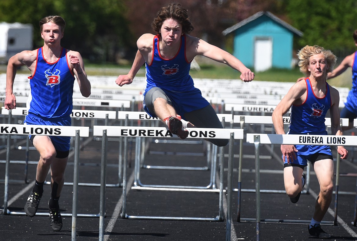 Isak Epperly outpaced his teammates to win the 110 hurdles at the district track meet in Eureka Saturday. The Vikings took the top five spots in the event. (Jeremy Weber/Bigfork Eagle)