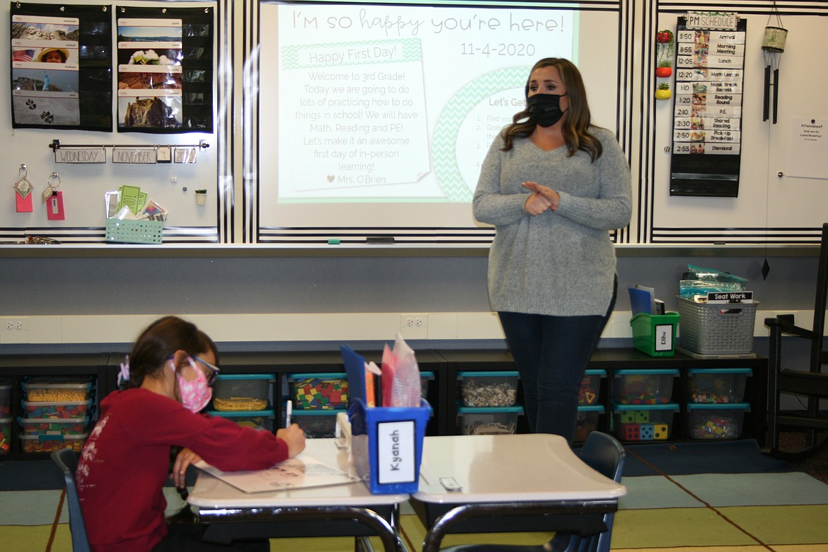 Jessica O’Brien welcomes students to her Scootney Springs classroom in November 2020. Othello School District officials have worked out a state-mandated reopening plan for the 2021-22 school year.