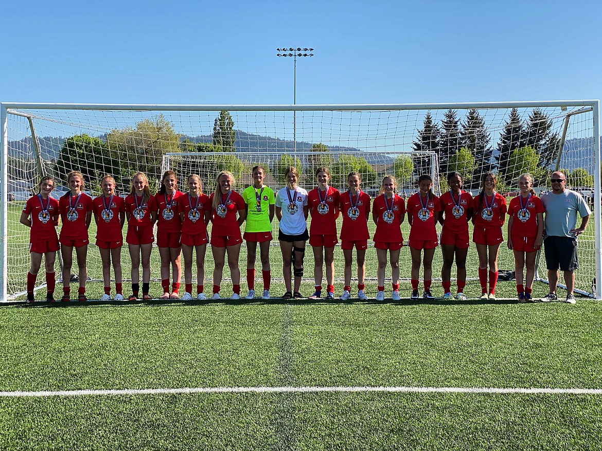 Courtesy photo
The Thorns North FC Girls 07 soccer team finished second in the gold division at the 30th annual Bill Eisenwinter Hotshot Tournament. The Thorns started off on Friday defeating NSC Montana 07 3-0 in the tournament opener, with goals from Natalie Thompson (assist Fiona Macdonald), Macdonald (assist Jamie Lawrence), and one from Kennedy Hartzell off of a deflection outside the box. On Saturday the Thorns squeezed out a win against Missoula Strikers Red 07G-PR with two early goals from Thompson and Macdonald. In the final few minutes Thompson scored from a penalty kick to put the Thorns up 3-2. Riley Brazle (assist Macdonald) and Thompson (deflection) scored against the Indie Chicas 07 AI in a 2-0 win Sunday morning, to advance to the finals. In the finals, the Thorns lost to Billings United BU Pink 07G-PR 2-0. From left are Bayah Ratigan, Natalie Thompson, Kyndall Dolin, Paige Hunt, Evelyn Bowie, Lily Bole, Kennedy Hartzell, Ellie McGowan, Rachel Corette, Libby Morrisroe, Riley Brazle, Marlee McCrum, Fiona Macdonald, Jamie Lawrence, Ava Glahe, Cecelia Dignan and coach Kirk Hartzell. Not pictured are Lilianna Brinkmeier and Emma Christensen.