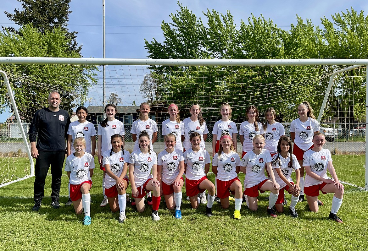 Courtesy photo
The Thorns North FC 08 Girls Red soccer team went 2-1-0 this past weekend in the Bill Eisenwinter Hotshot Tournament. Saturday morning the Thorns played FC Missoula White and tied 3-3. Talia Lambro had 2 goals and Allison Carrico had 1 goal for the Thorns. Avery Lathen, Ella Pearson and Elli Moss each had 1 assist. Saturday afternoon the Thorns beat Montana Surf/Blitz FC Gold 4-1. Sloan Waddell, Allison Carrico, Avery Lathen and Talia Lambro scored the Thorns' goals. Talia Lambro had 1 assist. Sunday morning TNFC beat the Boise Timbers Thorns Red 2-1. Cameron Fischer and Avery Lathen scored the goals.
Adysen Robinson and Macy Walters defended TNFC 08 Girls Red's goal for the games. In the front row from left are Avery Lathen, Allison Carrico, Macy Walters, Anna Ploof, Adysen Robinson, Avry Wright, Hailoh Whipple, Izzie Grimmett and Cameron Fischer; and back row from left, coach Camron Cutler, Sienna Low, Elli Moss, Ella Pearson, Nora Ryan, Kambrya Powers, Izzy Entzi, Sloan Waddell, Kamryn Kirk and Talia Lambro.