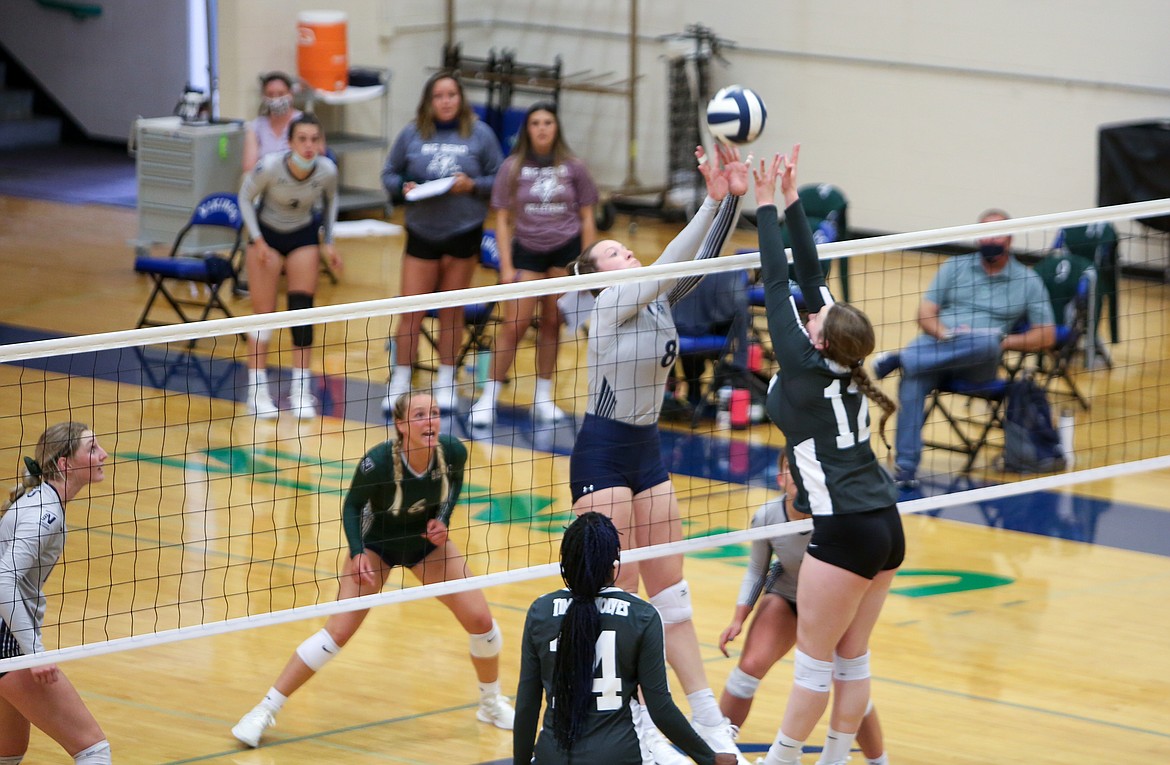 Big Bend’s Elli Rogers (8) goes up for the block in the first match Tuesday against Blue Mountain Community College in Moses Lake.