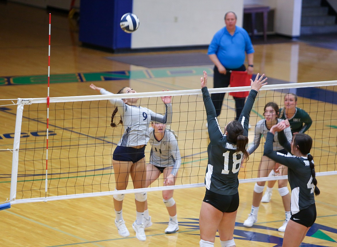 Mikayla Thompson skies up for the kill for Big Bend in the first game of the afternoon on Tuesday against Blue Mountain Community College.