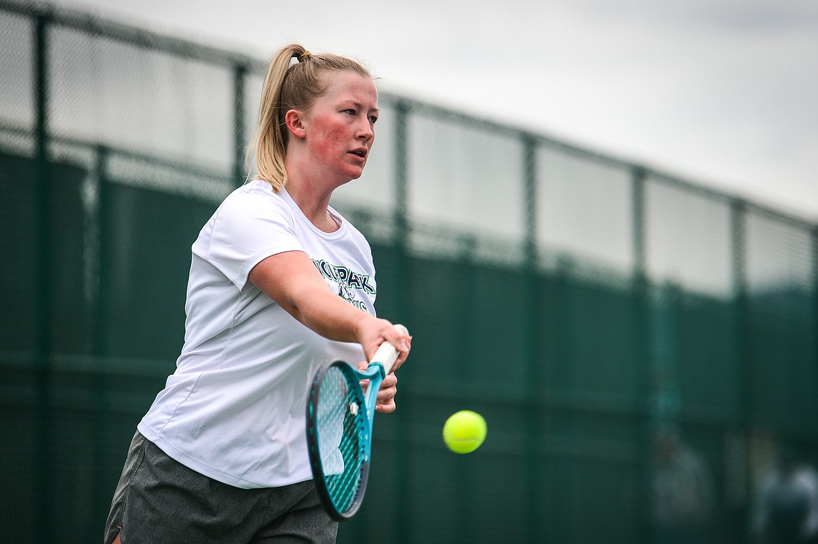 Glacier's Mariah Dickey hits a return in a Round 1 match against Great Falls' Bayley Keele during the Northern AA Divisional Tennis Tournament at Flathead Valley Community College on Thursday. (Casey Kreider/Daily Inter Lake)