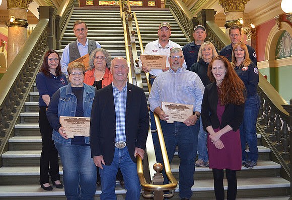 Gov. Greg Gianforte posed for a photo with Emergency Medical Service providers who were honored by the state for their work. (Courtesy photo)