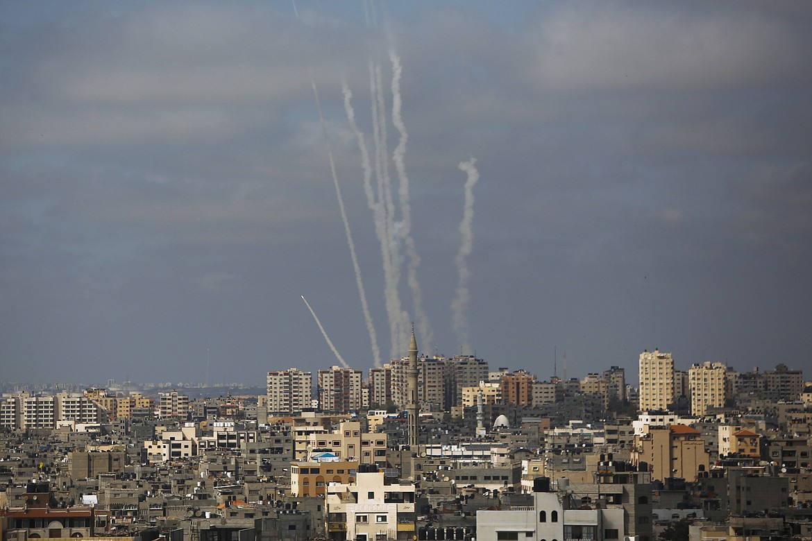 Rockets are launched from the Gaza Strip towards Israel, in Gaza City, Thursday, May 20, 2021.