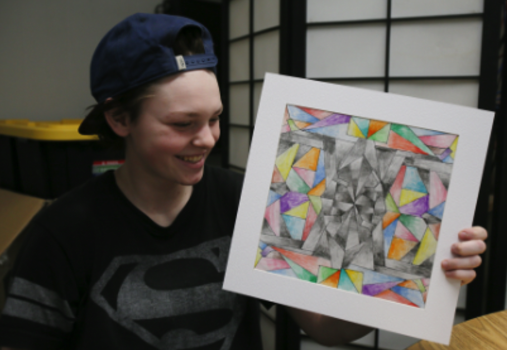 Molly Willard, a sophomore at Mountain View Alternative High School in Rathdrum, discusses her geometric shading project on Wednesday. At 6 p.m. Thursday, the school will host its inaugural Art on the Moose Art and Theater Festival.