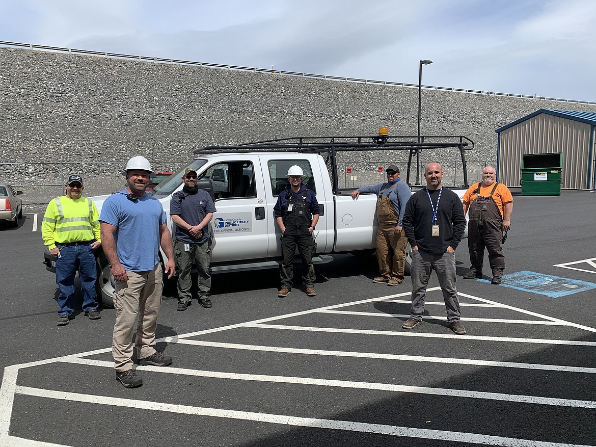 Grant County PUD employees (from left) Roy Bensch, Jeremy Coleman, Stephen Gilliland, Travis Havens, Tyrone Mertes, Brian Saunders and Mike Allen received a “Safety Heroism” award for their quick work in rescuing two men from the Columbia River in November. Willie Stone also helped with the rescue, but is not pictured.