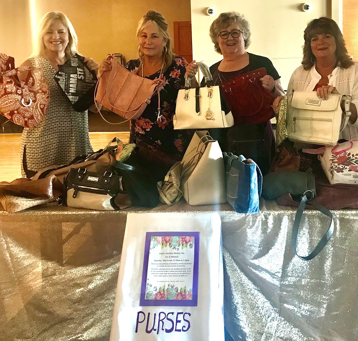 The CDA Eagles Auxiliary #486 held their annual Mother's Day Tea and Mimosas on Saturday, May 7.  Ladies attending brought a purses filled with items for women in the St. Vincent de Paul's women shelter and senior facilities. Pictured from left are Barb Smalley, SVDP North Idaho development director; Laura Lachapelle, Auxiliary vice-president; Cathy Hudson, Auxiliary conductor; and Debbie Magnuson, Auxiliary trustee.