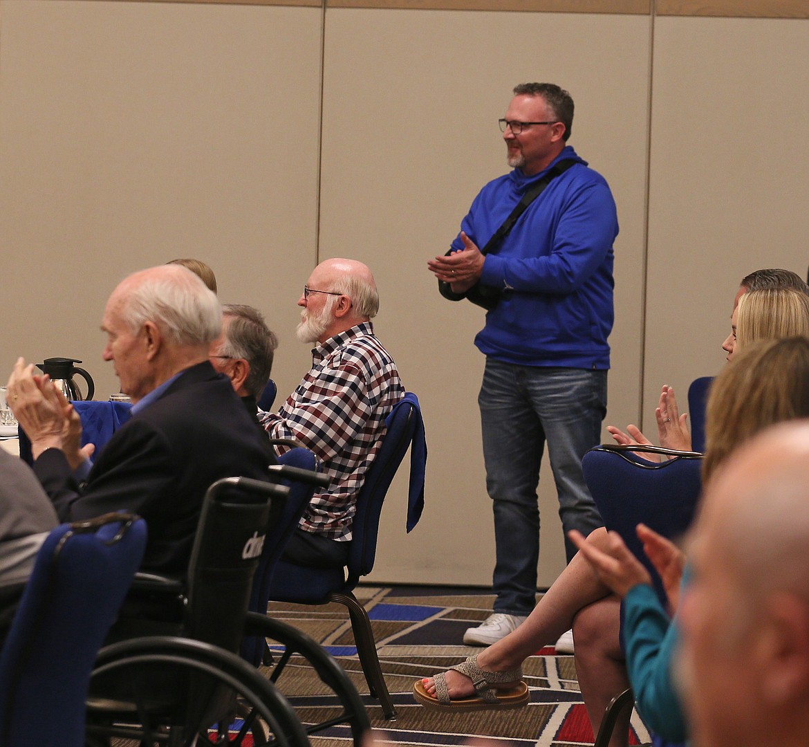 Greg Washington, a board member with the Coeur d'Alene High School Viking Booster Club and Educational Foundation applauds as his grant is announced during the Coeur d'Alene Rotary Club meeting Friday. Rotary distributed $46,000 to nearly 20 area nonprofits and causes.