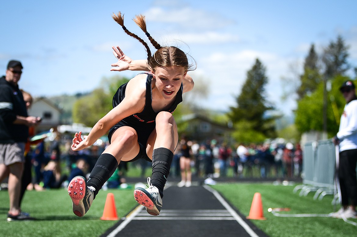 Flathead's Mia Stephan competes in the triple jump during the Western AA Divisional Track Meet at Legends Stadium on Saturday. (Casey Kreider/Daily Inter Lake)