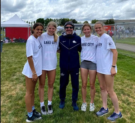 Courtesy photo
The Lake City High girls track and field team captured state 5A titles in the 4x100- and 4x200-meter relay on Saturday at Eagle High. From left, are: Keturah Vogel-Greenwood, Georgia Whitehead, Lake City head track and field coach Kelly Reed, Angelyca Chapman and Hailey Parks.