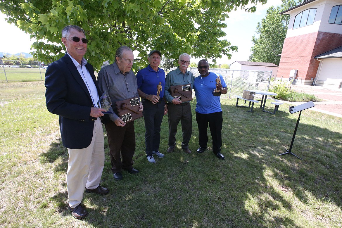 (From left) Jerry Keane, Norman Gissel, Dane Hanna, Ken Howard and Cedric Clark humbly accepted awards from the Kootenai County Task Force on Human Relations Saturday. Keane was awarded the 2020 Civil Rights Award for his work as Post Falls School Superintendent battling with bullying in his district. Gissel and Howard received 20th-anniversary commemorations for their work on the lawsuit that brought down the Aryan Nations. Clark and Judi Hanna received Bill Wassmuth Memorial Volunteer Of The Year awards for their work with the task force; Dane accepted the award on his wife's behalf. (CRAIG NORTHRUP/Press)