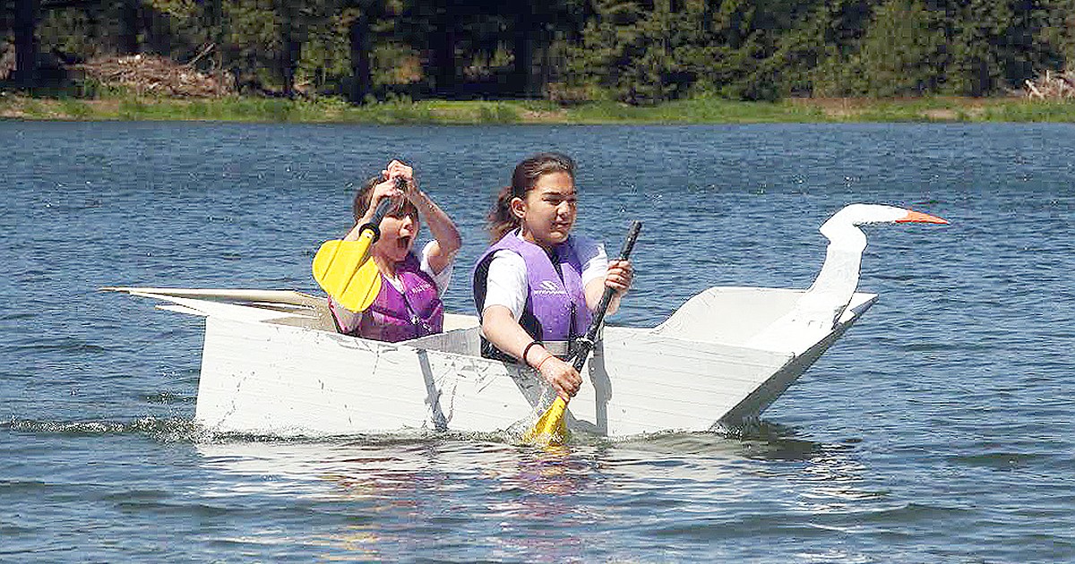 Spirit Lake Cardboard Boat Regatta cruises on its inaugural run