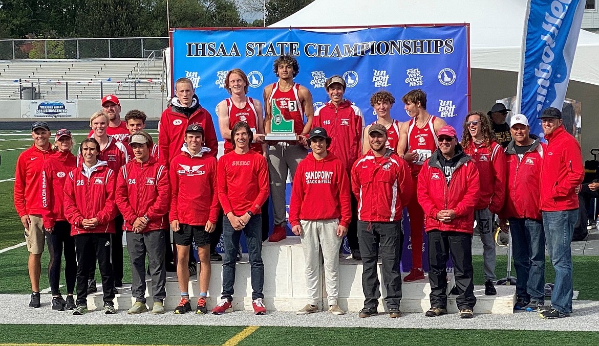 The Sandpoint boys track team stands on the podium with their third place trophy on Saturday.