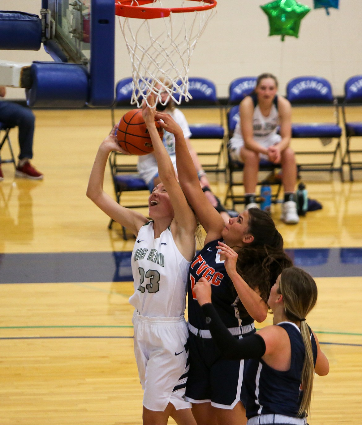 Morgan Rushton takes the contact as she goes up for a layup under the rim for Big Bend in the second half of the 71-68 overtime win on Saturday.