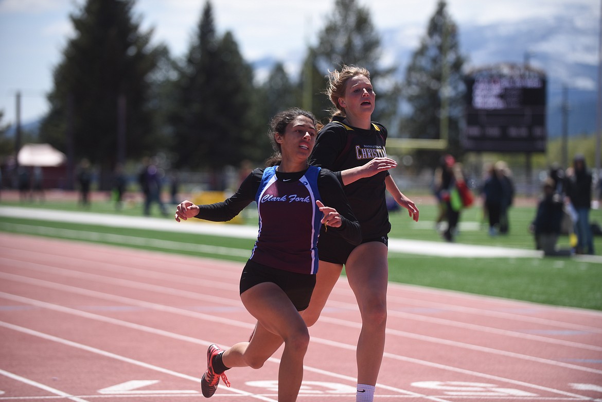 Clark Fork’s Isabella Pereira, shown here in the 100-meter dash at last week’s Class C Divisional in Missoula, qualified for this week’s state championships after placing third in the long jump and triple jumps and fourth in the 100. (Scott Shindledecker/Mineral Independent)