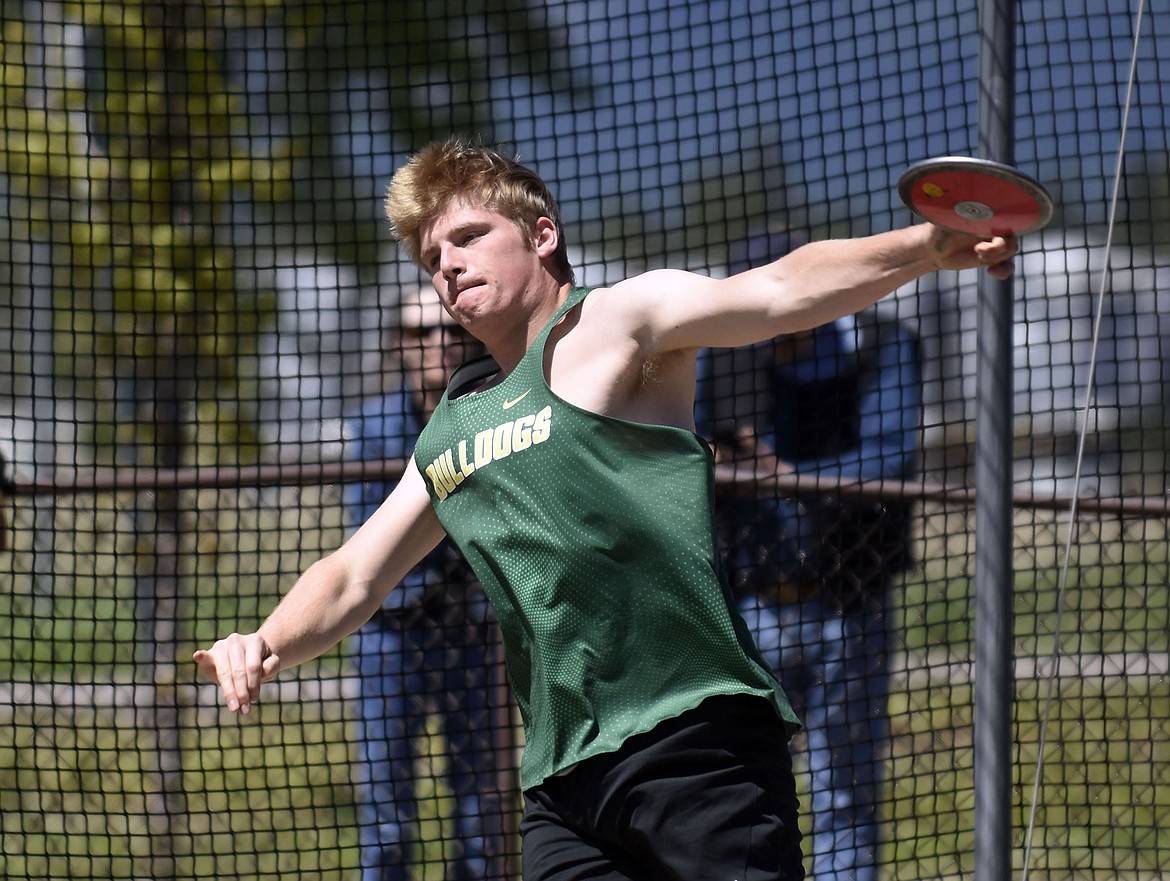 Bulldog Ben Dalen competes in the discus at the Western A Divisional track meet in Columbia Falls on Saturday. (Teresa Byrd/Hungry Horse News)