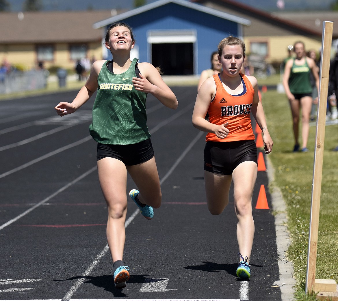 Whitefish's Raiya McCutcheon crosses the finish line in the 3200 meters at the Western A divisional track meet in Columbia Falls on Saturday. (Teresa Byrd/Hungry Horse News)