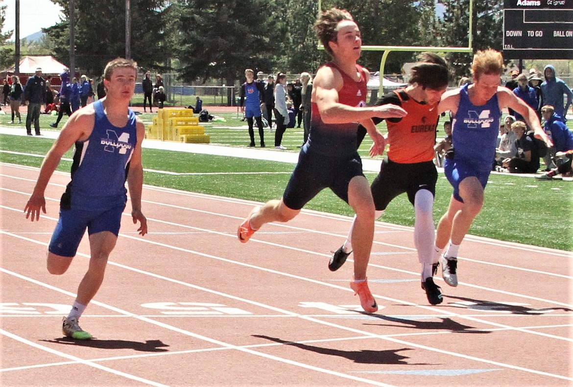 Mission sprinter Charles Adams, far left, finish second, and teammate Layne Spidel, far right, finished sixth in the 100 meters at the Western B divisional meet at Missoula. (Courtesy of Daisy Adams)