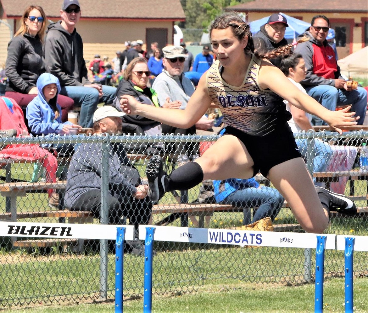 Polson's Michelle Dale competes in the 300 hurdles at the Western A divisional meet at Columbia Falls. (Courtesy of Greg Nelson)
