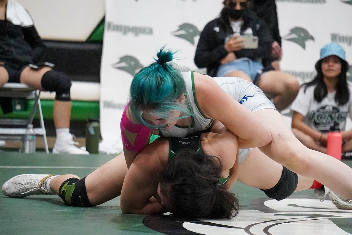 Big Bend's Cora Orton goes for the pin at the Women's Junior College National Championship in Roseburg, Oregon, on Friday, May 14.