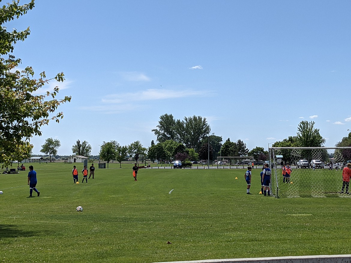 Children play soccer Sunday afternoon at Cascade Park on Valley Road Northeast. The park is one of those included in the Moses Lake Parks, Recreation & Cultural Services Department’s comprehensive master plan.