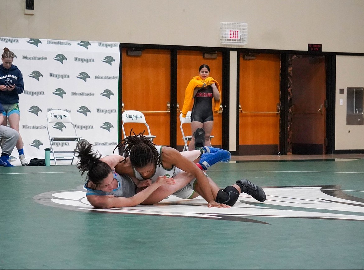 Big Bend's Aliyah Yates looks for the pin against her opponent at the Women's Junior College National Championship on Friday, May 14.
