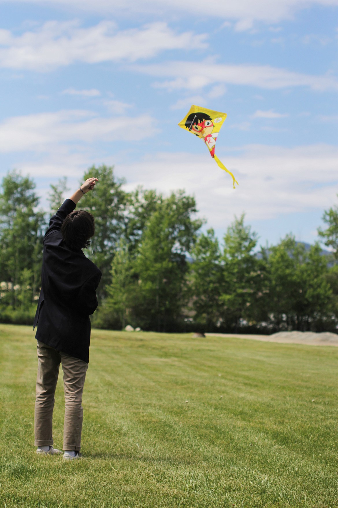 Eoin Eddy flies a kite Friday at Sandpoint High School.