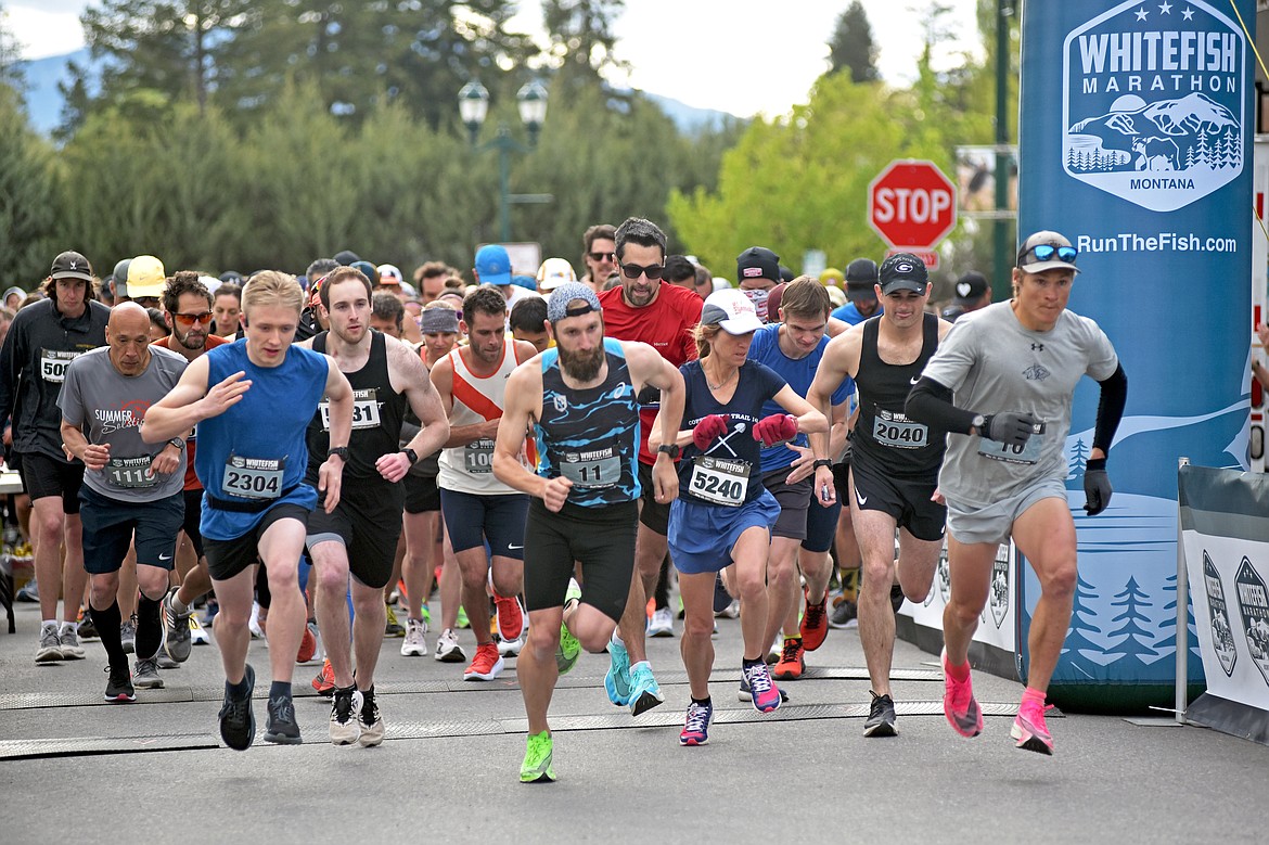 Participants begin running in the annual Whitefish Marathon at 8 a.m. on Saturday in Whitefish. (Whitney England/Whitefish Pilot)