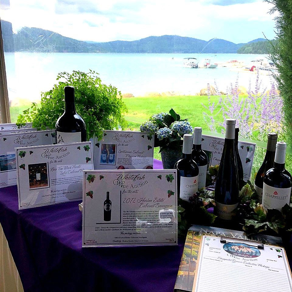 Bottles of wine await bidding at the first Whiefish Wine Auction for the Arts.